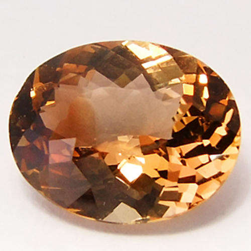 3.97 ct IMPRESSIVE OVAL CUT UNHEATED IMPERIAL TOPAZ GEMSTONE