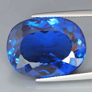 Huge Top Quality AAA 32.45 ct Oval Cut London Blue Topaz Gemstone