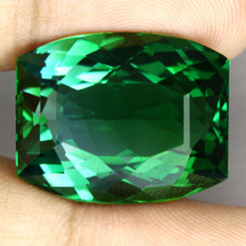 23.78 ct DELUXE TOP BARREL SHAPE FACETED CUT GREEN AMETYST  - Prasiolite Gemstone
