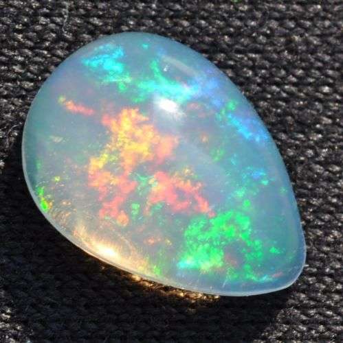 0.75 ct ETHIOPIAN WELO OPAL - NATURAL BLAZING FIERY OPAL GEMSTONE