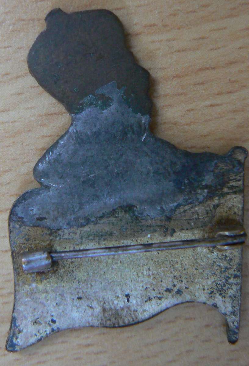 Sweetheart brooch made from Union Jack pin with mounted cut-out of SA penny 1923-1936