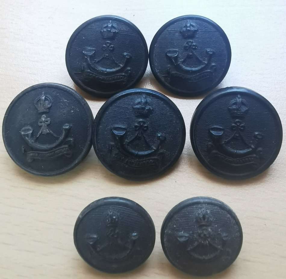 Lot of 7 King`s African Rifles composite buttons
