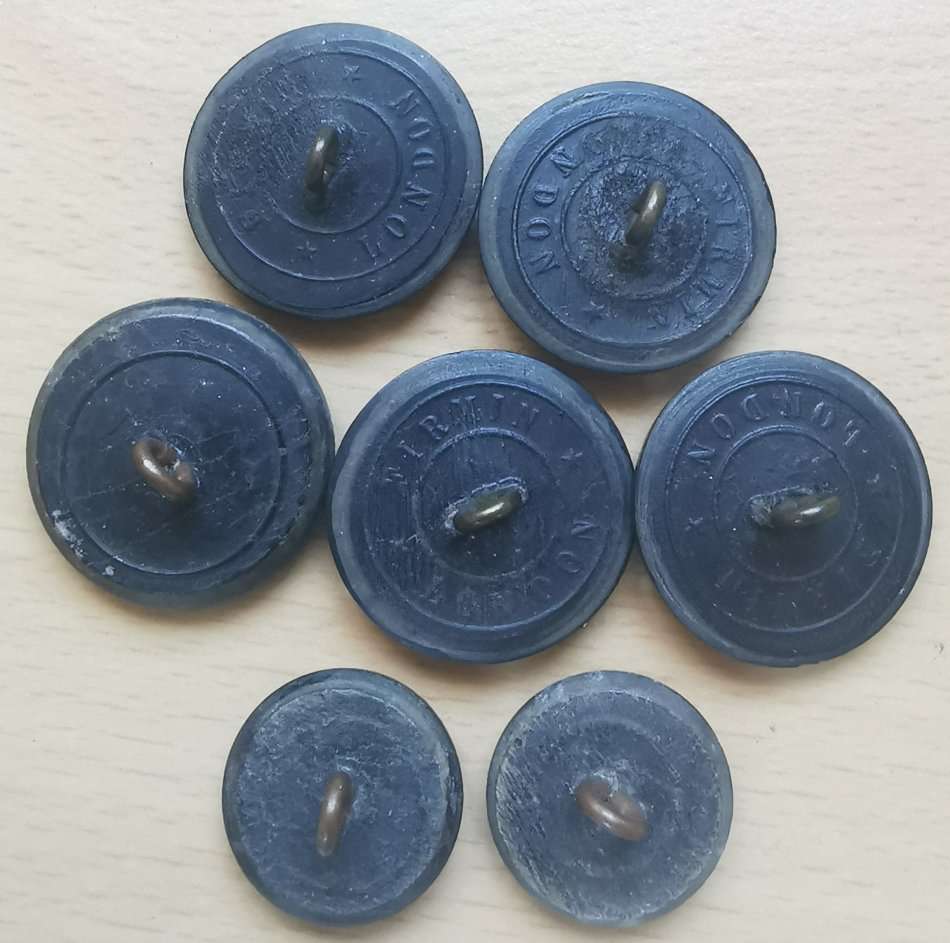 Lot of 7 King`s African Rifles composite buttons