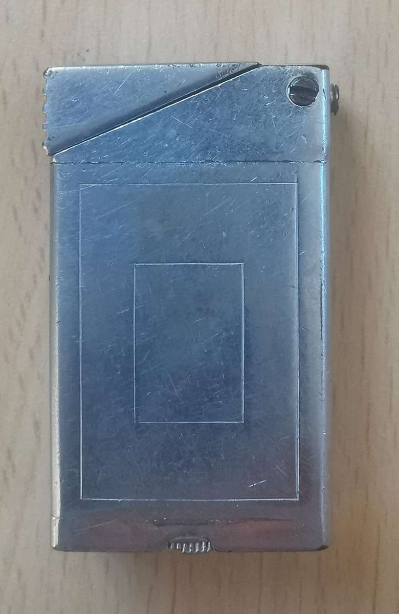 1940s Royal Air Forces Association (RAFA) lighter with sunken insignia