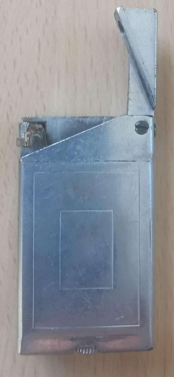 1940s Royal Air Forces Association (RAFA) lighter with sunken insignia