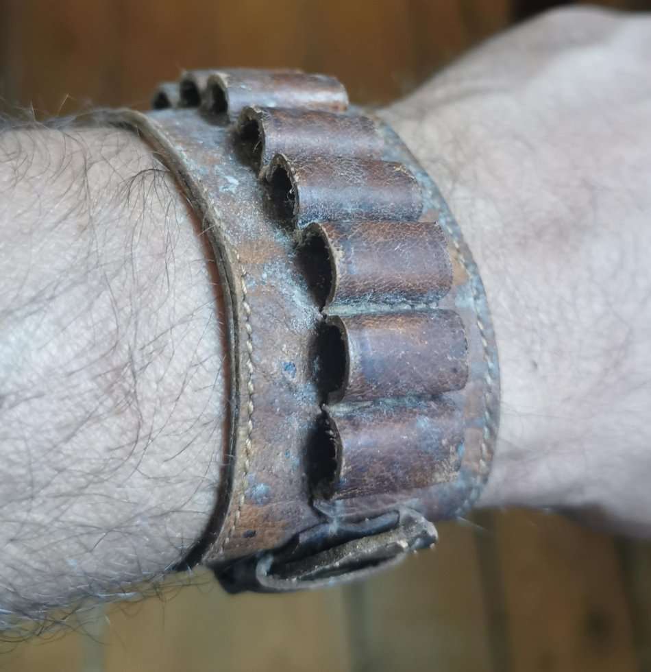 Unusual old leather 10-shot ammo cartridge wristband - probably for a .22
