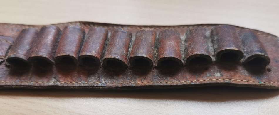 Unusual old leather 10-shot ammo cartridge wristband - probably for a .22