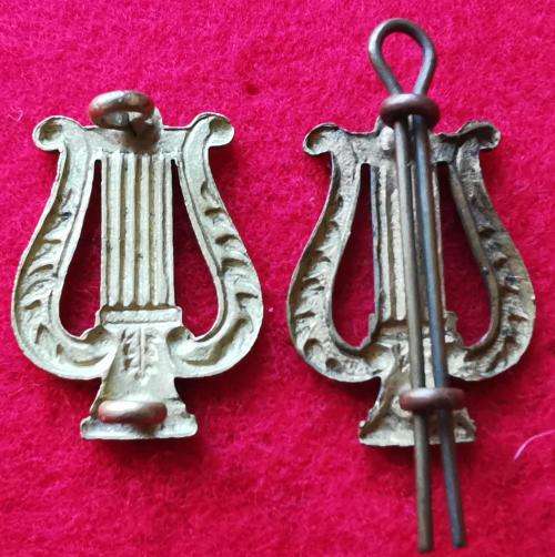 Royal Marines musician`s collar badges (x2)