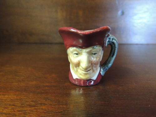 ROYAL DOULTON TINY - "THE CARDINEL"