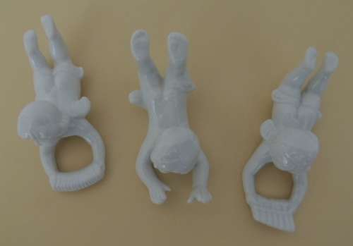 TRIO OF PORCELAIN CHERUBS