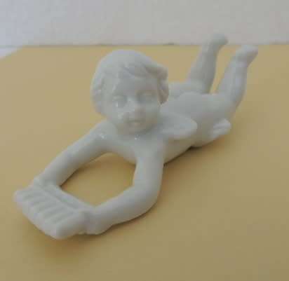 TRIO OF PORCELAIN CHERUBS