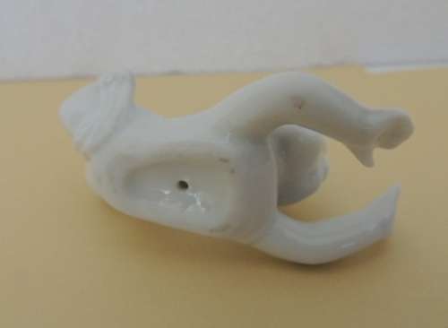 TRIO OF PORCELAIN CHERUBS