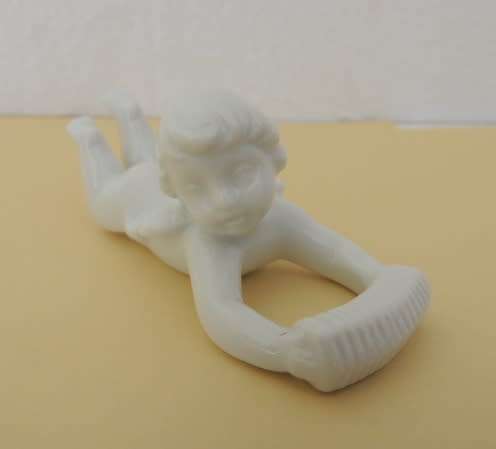 TRIO OF PORCELAIN CHERUBS