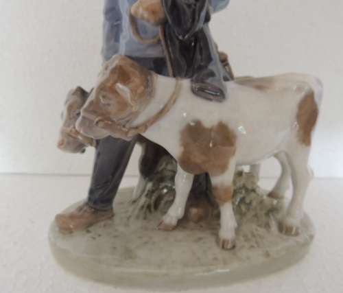 ROYAL COPENHAGEN FIGURINE - BOY WITH TWO CALVES # 1858 FOR JOHANNES