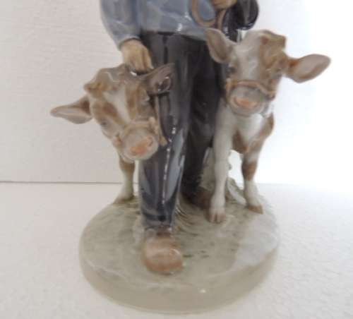 ROYAL COPENHAGEN FIGURINE - BOY WITH TWO CALVES # 1858 FOR JOHANNES