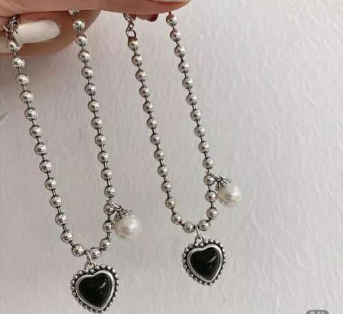925 Silver Onyx Heart and Pearl Bracelet.