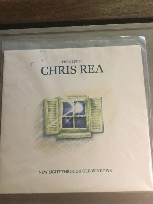Chris Rea- New Light Through Old Windows: The Best of vinyl ( EX / VG )