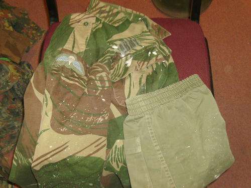 Rhodesian para, shirt and pant, medium sizes, from a veteran, paint damage, with insignia.