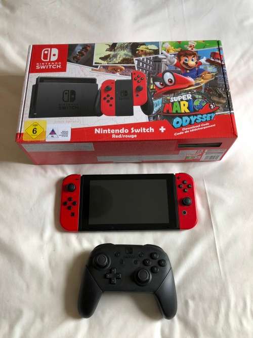 Nintendo Switch Console with Red Controllers (Mario Odyssey Edition) + Extras