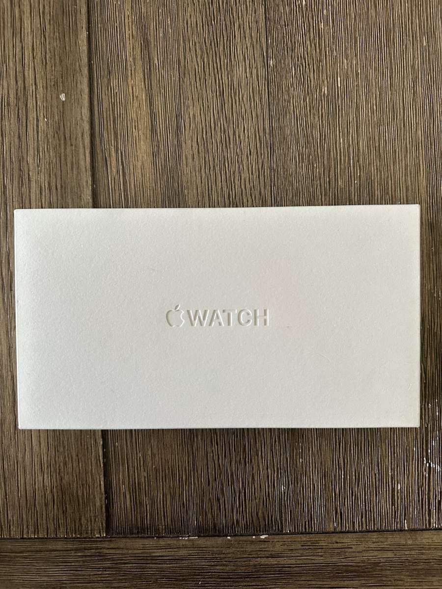 Apple Watch Ultra GPS + Cellular, 49mm Titanium Case with White Ocean Band