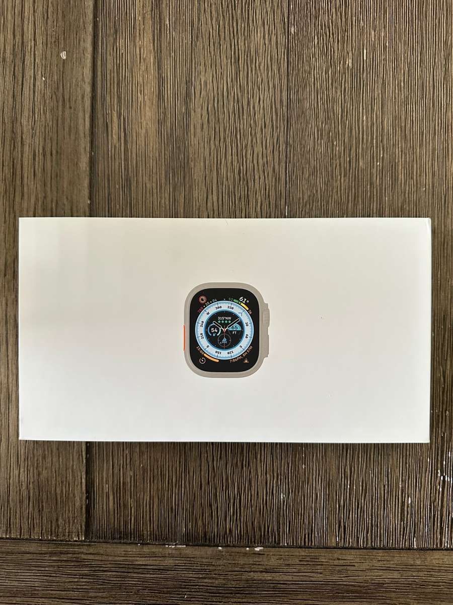 Apple Watch Ultra GPS + Cellular, 49mm Titanium Case with White Ocean Band