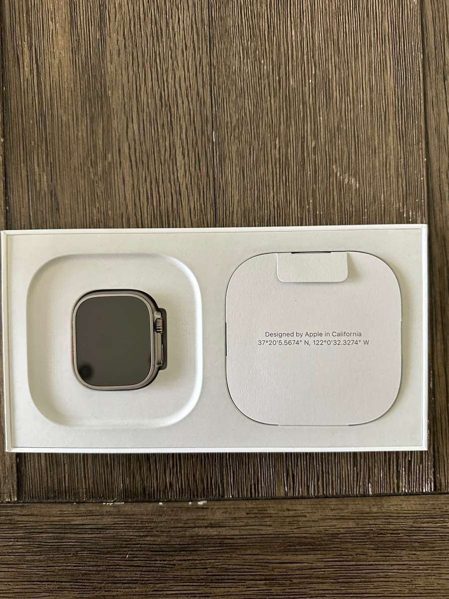 Apple Watch Ultra GPS + Cellular, 49mm Titanium Case with White Ocean Band