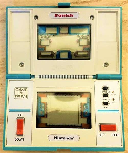 NINTENDO GAME AND WATCH SQUISH(MG61) IN MINT CONDITION.