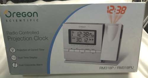 Clock Radio with projection Oregon Scientific make, in box.