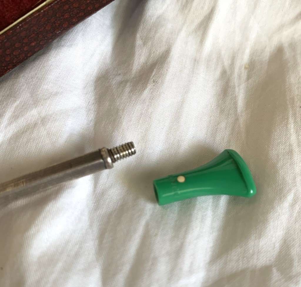 Dunhill silver cigarette holder, in box.