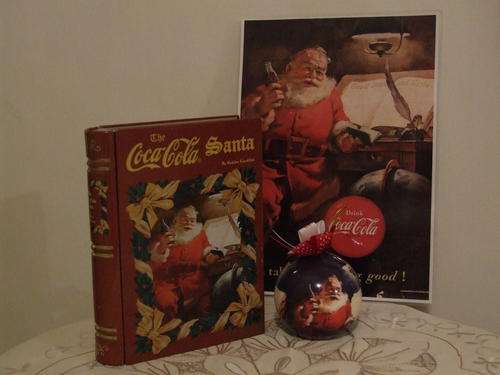 "A COLLECTORS DREAM" - COCA COLA SANTA CLAUSE TIN IN THE SHAPE OF A BOOK  - HISTORY OF THE DESIGNER