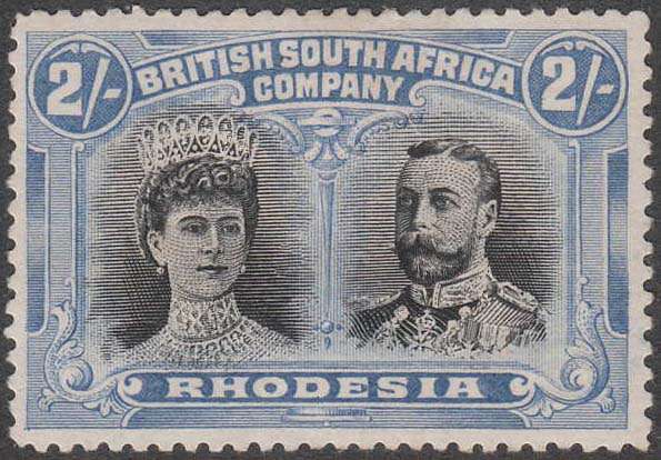 RHODESIA 1910 DOUBLE HEADS 2/- BLACK AND ULTRAMARINE MOUNTED MINT. SACC 153 C/V R2500