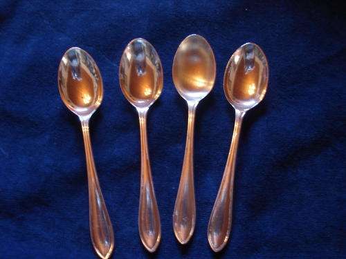 FOUR HALLMARKED SILVER SPOONS