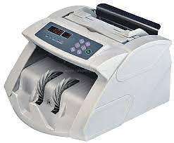 MONEY COUNTER WITH COUNTERFEIT DETECTION.