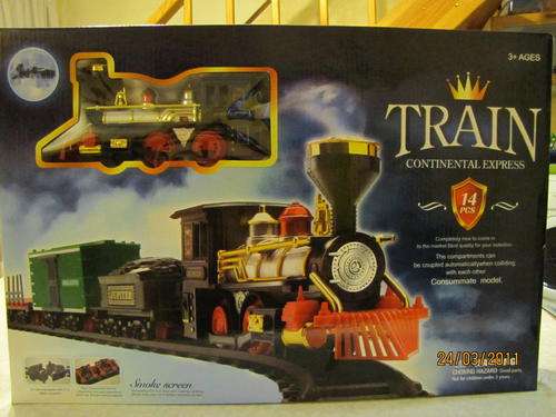 TRAIN SET with an Engine, 3 cars and tracks