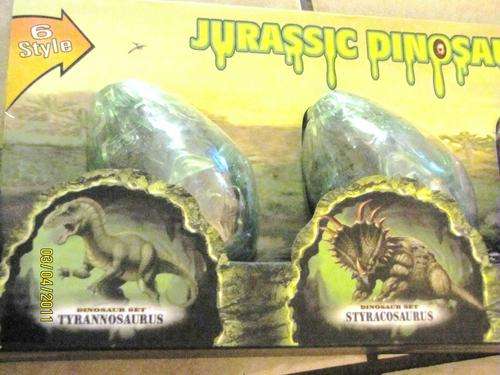 6 DINOSAUR EGGS WITH DIFFERENT DINOSAURS IN EACH ONE