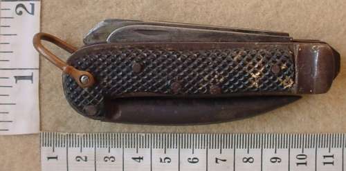 SA UDF Army issue clasp knife with can opener, marlin spike, blade marked SSP 1940 and Broad Arrow