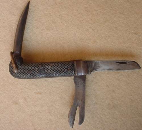 SA UDF Army issue clasp knife with can opener, marlin spike, blade marked SSP 1940 and Broad Arrow