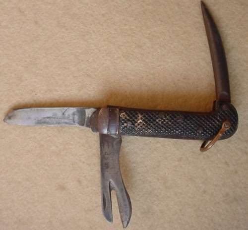 SA UDF Army issue clasp knife with can opener, marlin spike, blade marked SSP 1940 and Broad Arrow