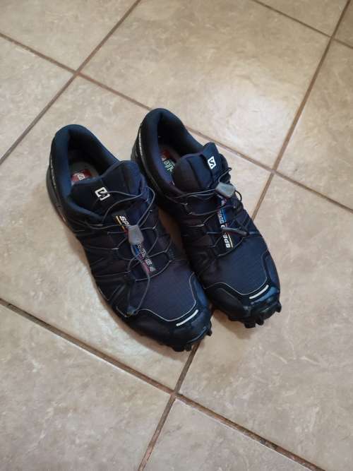 Men's second hand Solomon Speedcross 4, size 9.
