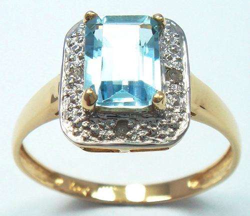 LADY 10K YELLOW GOLD BLUE TOPAZ & DIAMOND RNG