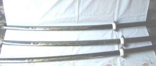 BOKKEN - WOODEN, OR PLASTIC BLACK /BROWN