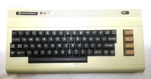Retro Commodore VIC 20 Console with related Manuals, Games and Hardware in Working Condition