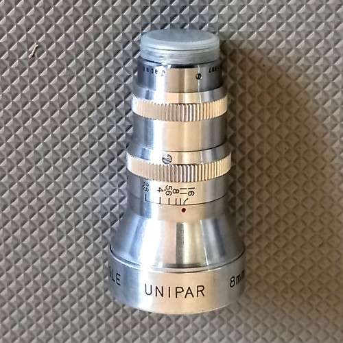 Unipar 8mm F2.8 Movie Wide Angle Movie Camera Lens with Front and Rear Caps. Working condition
