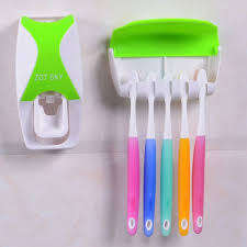 Toothpaste Dispenser and Toothbrush Holder