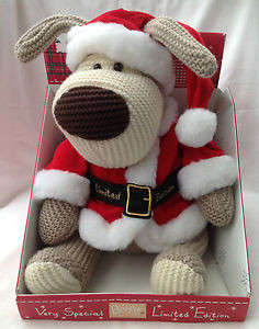 Boofle with red Santa hat, Santa coat and black " limited edition" belt on Boofle plinth