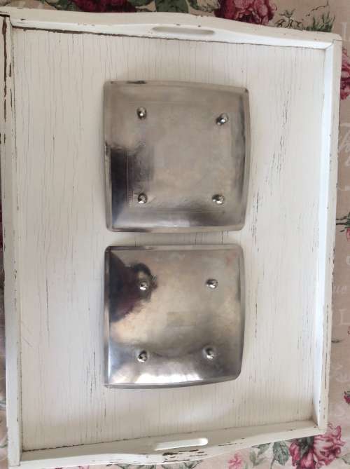 2 silver plated trivets