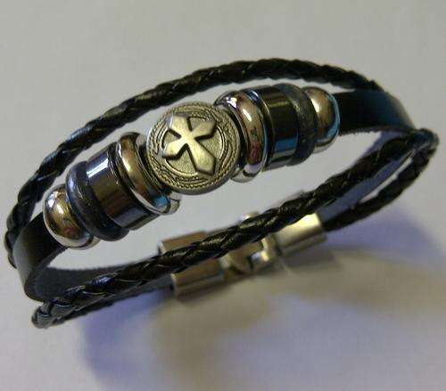 **LEATHER CHARM BRACELET**ONLY 2 AVAILABLE**SEE PICTURES**DONT MISS OUT**