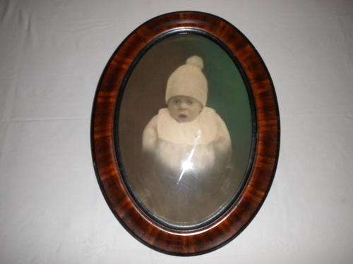 VERY OLD WOODEN FRAME WITH OLEOGRAPH OF CHILD INCLUDING BUBBLE TYPE GLASS