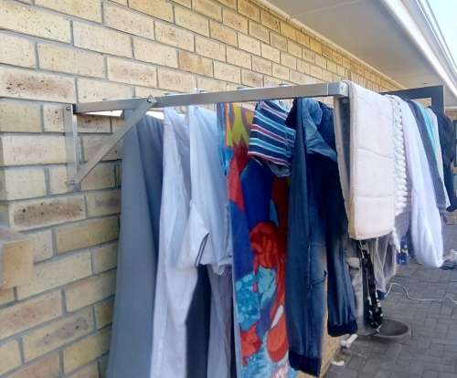 Aluminium wall mounted folding cloths / washing line