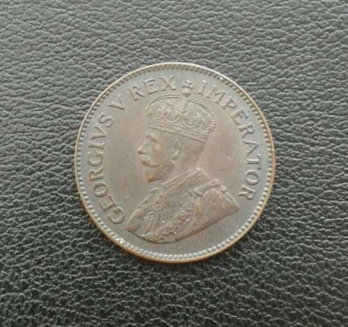 The scarce 1935 quarter penny in AU grade (low mintage)